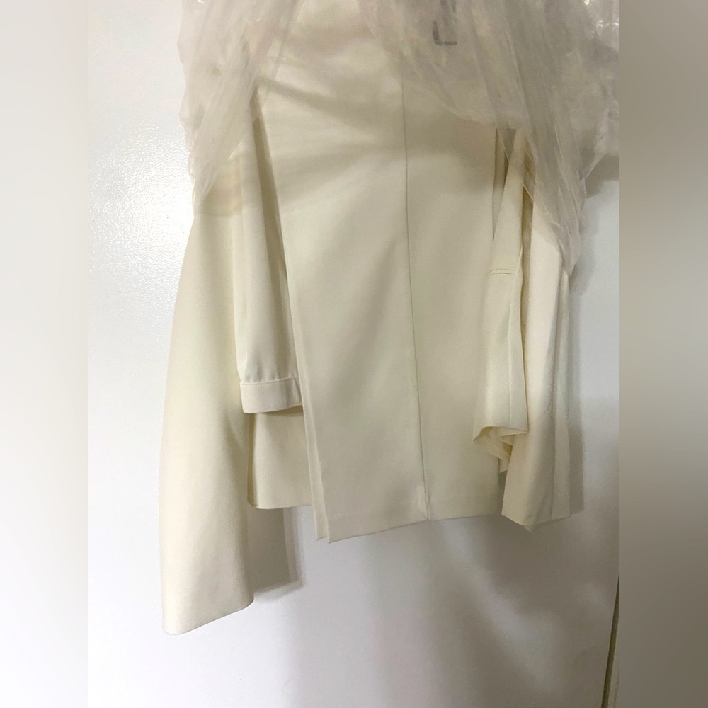 Ivory dress pants. Button front.